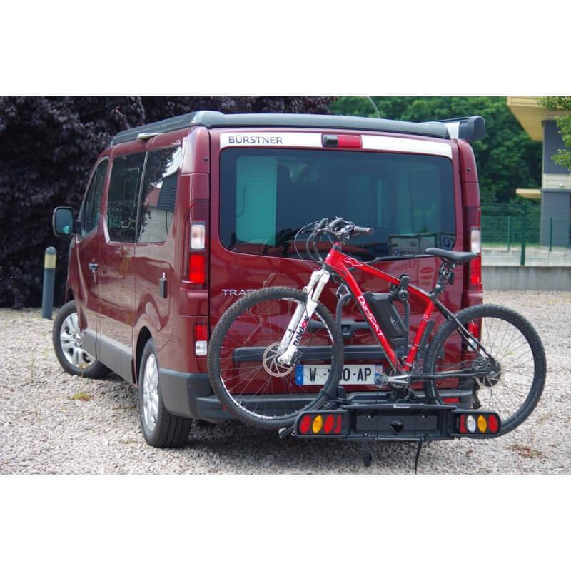 Porte-vélo sur boule d'attelage pour Fourgons Renault Trafic 3 Porte-vélos sur boule d'attelage pour Fourgons Renault Trafic 3 avec un vélo électrique chargé