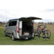 Porte-vélos VAN-BIKE 3 pour van Ford Custom Porte-vélos VAN-BIKE 3 pour van Ford Custom avec hayon ouvert et 2 vélos électriques chargés